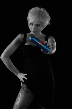 Black and White Female Portrait with colour bottle of hair spray - Photographed by Peter Gatt - PHOTO101.CA 